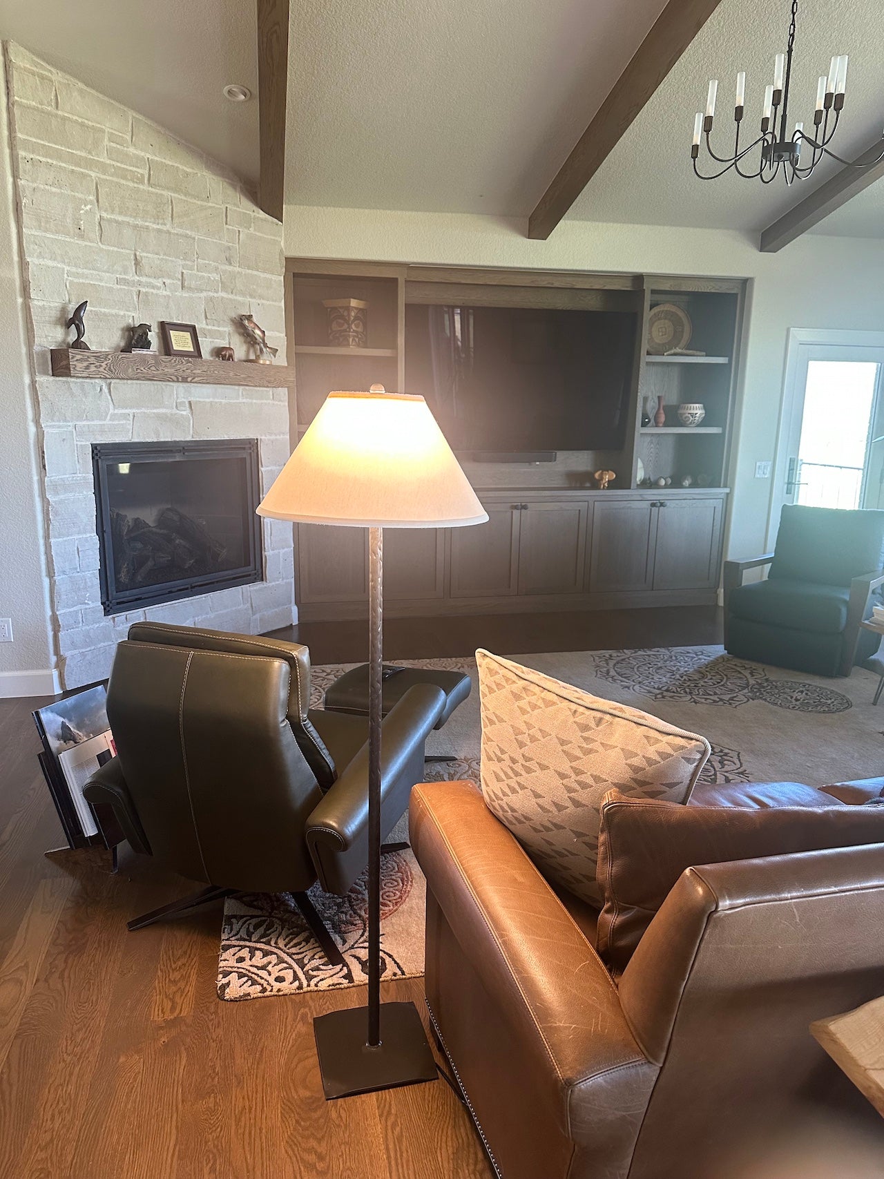 An Urban Forge Greenwood Stick floor lamp in a cozy living room.