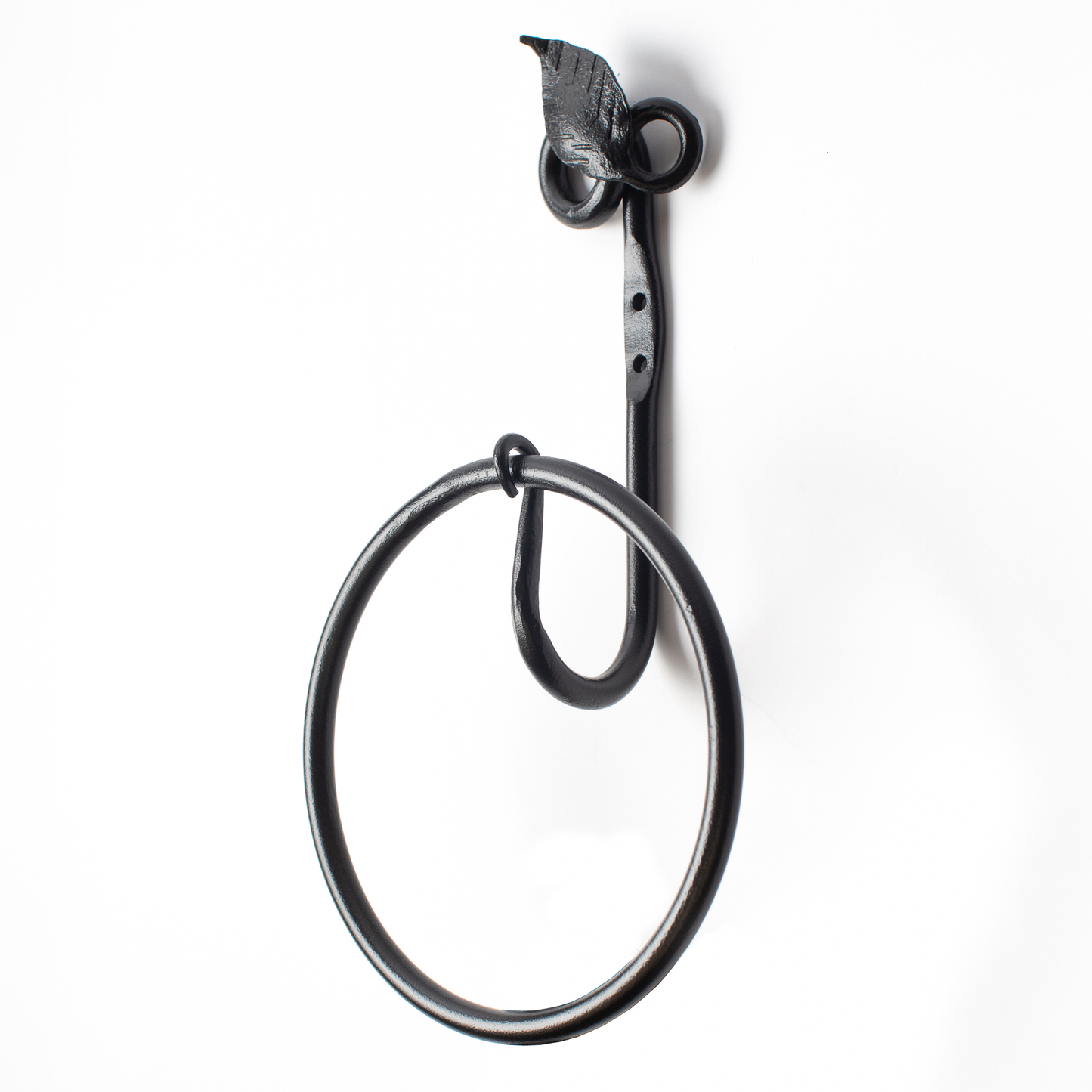 The Urban Forge Leaf towel ring in a black finish. The towel ring is pictured against a white backdrop.