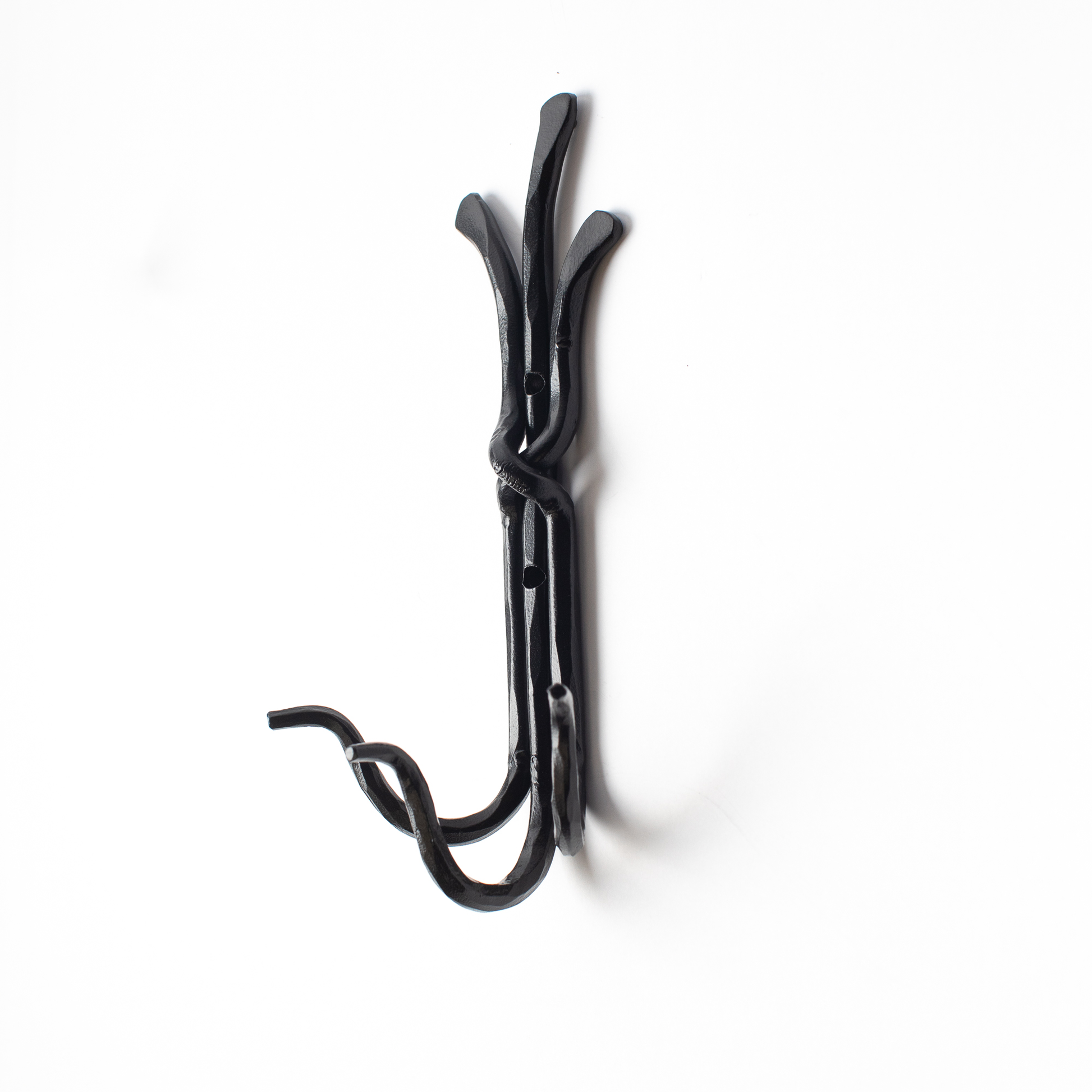An Urban Forge Black River hand-forged iron triple hook in a black finish. The hook is pictured against a white backdrop.