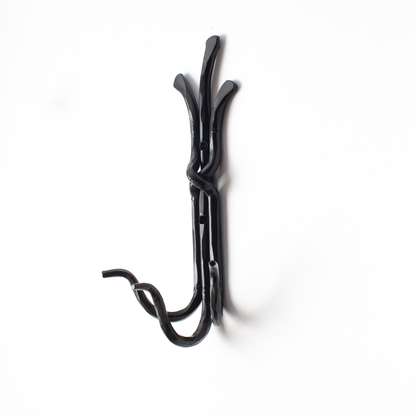 An Urban Forge Black River hand-forged iron triple hook in a black finish. The hook is pictured against a white backdrop.
